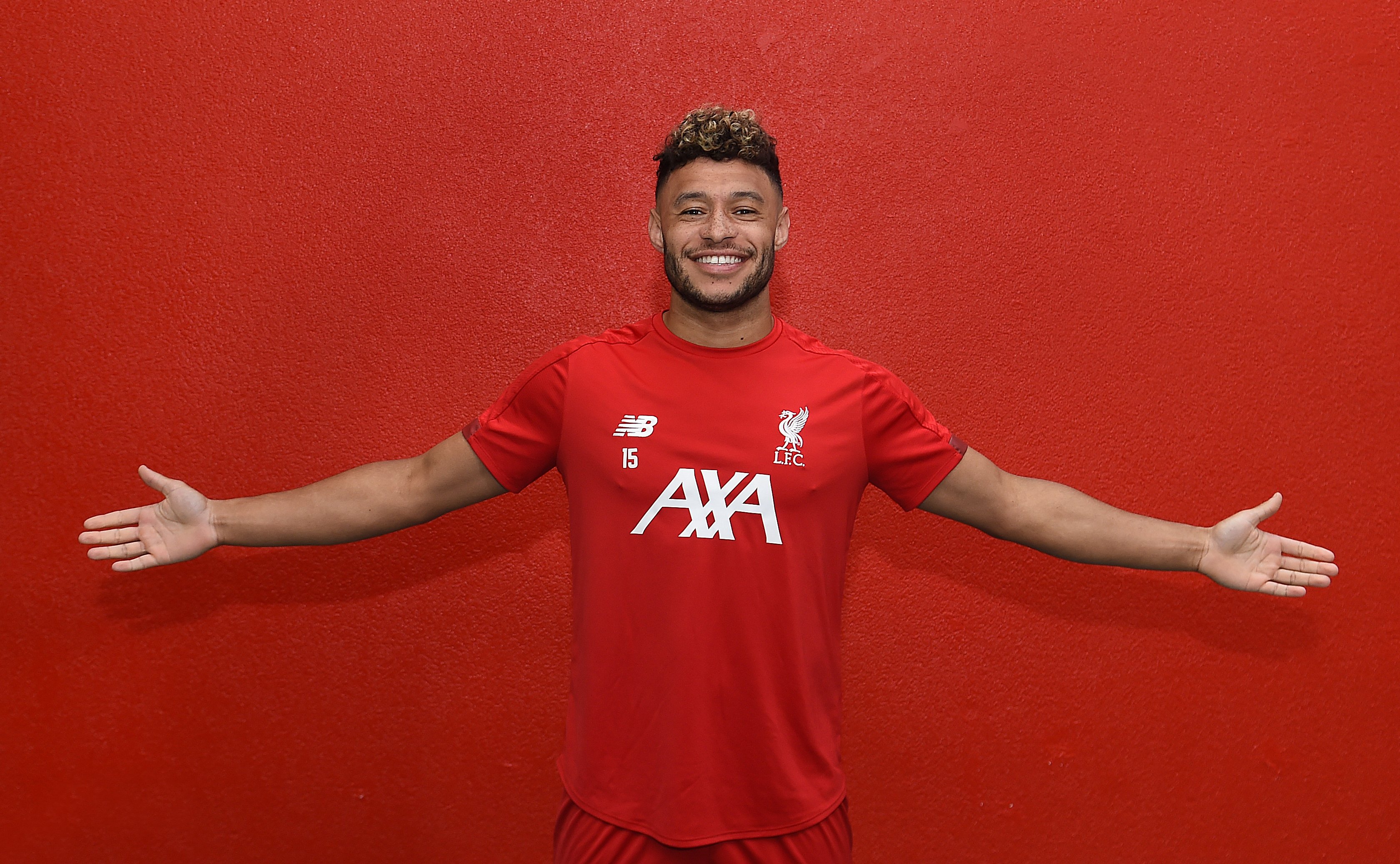 Alex Oxlade-Chamberlain extends with Liverpool.