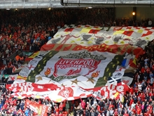 Liverpool thrashes Huddersfield to regain top of Premiership