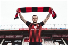 Wilshere back to playing football with a familiar club